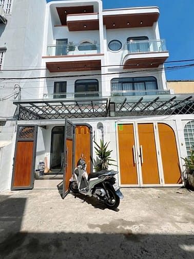 Hình ảnh Bán nhà 4 tầng - hẻm xe hơi 5m