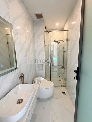Hình ảnh Bán nhà 4 tầng - hẻm xe hơi 5m