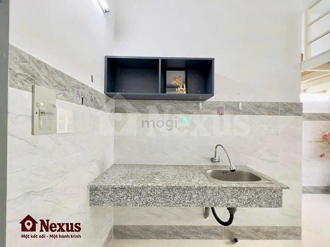 Hình ảnh Duplex cửa sổ thoáng gác cao gần KCX Tân Thuận giá rẻ Full NT