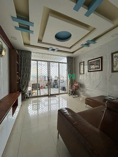 Hình ảnh Phạm Văn Đồng – Bình Thạnh – 6 tầng BTCT – có thang máy – SHR – 13.5 t