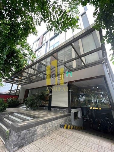 Hình ảnh Tòa Văn Phòng Hầm 4 Lầu Mặt Tiền Đường Đồng Văn Cống 900m2