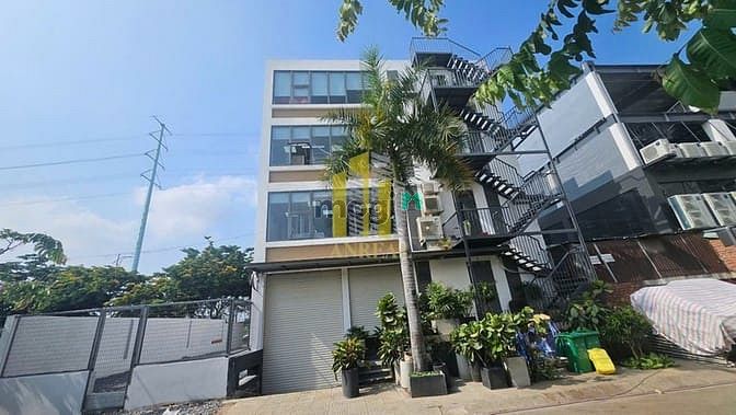 Hình ảnh Tòa Văn Phòng Hầm 4 Lầu Mặt Tiền Đường Đồng Văn Cống 900m2