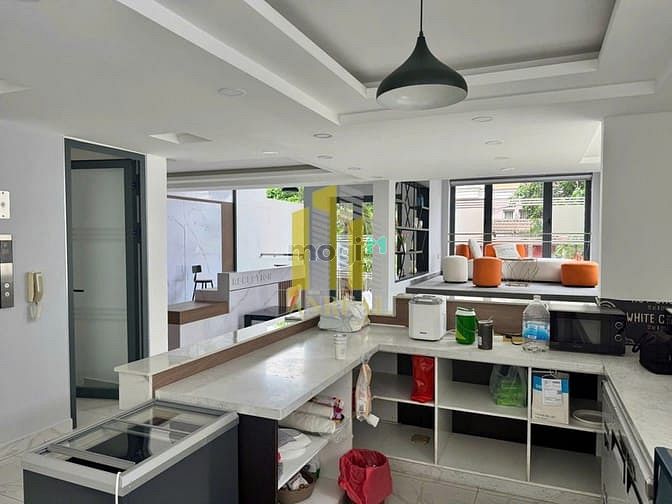 Hình ảnh Tòa Nhà Sàn Trống Đường Trần Não DTSD 500m2 - Ngang 10m Giá 100 Triệu