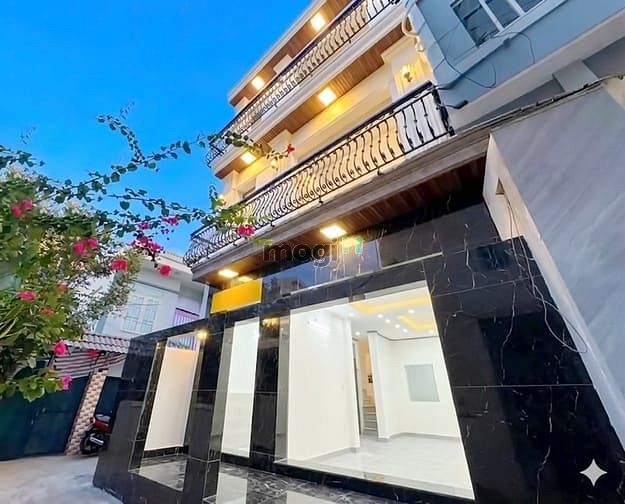 Hình ảnh Nhà mới 100% 3 lầu có thang máy hẻm 1027 Huỳnh Tấn Phát, Quận 7