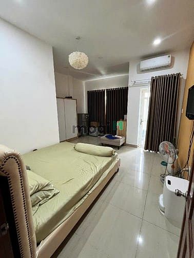 Hình ảnh CHDV 4 tầng, đường Phú Thuận Quận 7. DT 8*25, 36 p TN ~ 100 tr. 16 tỷ.