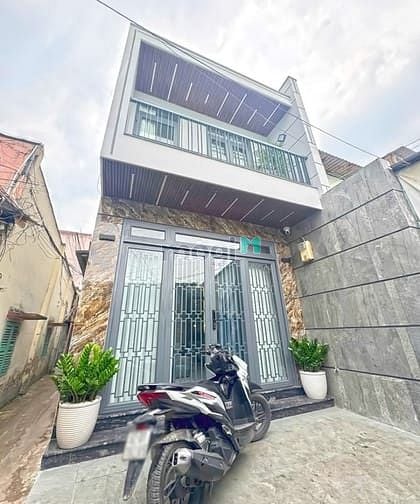 Hình ảnh Hàng hiếm - Nhà đẹp 1 lầu mặt tiền kinh doanh chợ Tân Quy, Quận 7