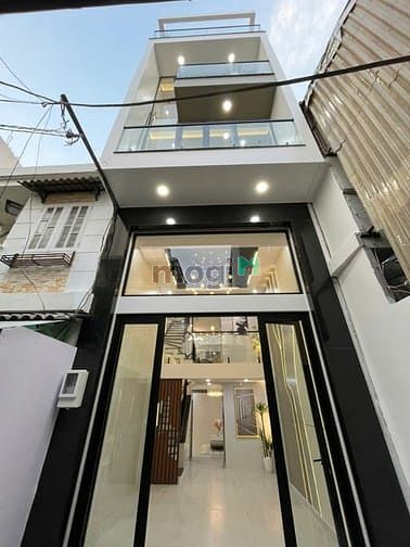 Hình ảnh Nhà 5 tầng xây mới có nội thất,thang máy Quận 11