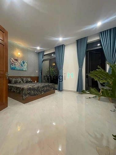 Hình ảnh Nhà hẻm xe hơi quận Tân Bình 60m2 vuông vức đẹp 3PN 4WC