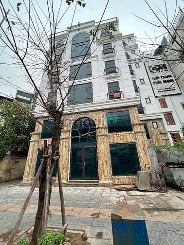 Hình ảnh Cho thuê toà nhà mới phố Đội Cấn 140m2 x 9 tẩng + hầm . Vị trí lô góc