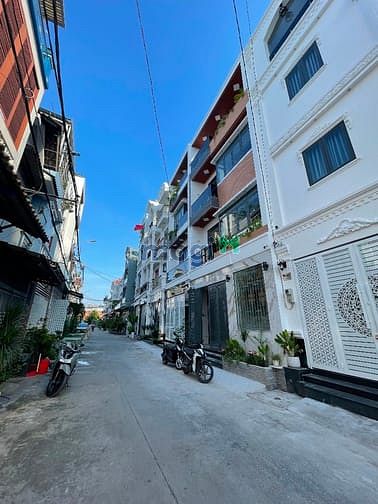 Hình ảnh Nhà Phố XÂY DỰNG MỚI CÓ THANG MÁY - Đường thông 8m 2279 Huỳnh Tấn Phát