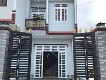 Hình ảnh Chuyển định cư cần bán nhà 125m2 1 trêt 1 lầu đối diện chợ
