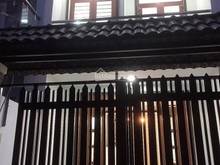 Hình ảnh 1 trệt 2 lầu, hẻm xe hơi thông đường Lê Văn Việt