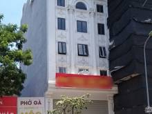 Hình ảnh Cho thuê nhà mặt phố Hoàng Cầu, DT 240m, 8 tầng, 1 hầm. 300 triệu
