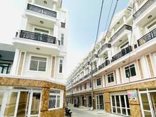 Hình ảnh 26 căn nhà phố mặt tiền hẻm QL13,1T3L có sân đậu xe hơi trong nhà,SHR