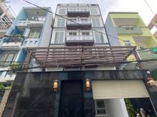 Hình ảnh Nhà nguyên căn 122 Đặng Văn Ngữ, 8*20m 1 hầm 7 tầng giá 200 tr/tháng