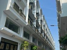 Hình ảnh Chính chủ cần bán nhà 1 trệt 3 lầu đường xe hơi kế bên KDC Lê Thành