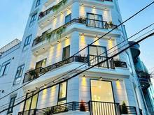 Hình ảnh Nhà mới xây full nội thất  hẻm xe hơi căn góc 2 MT Phan Huy Ích