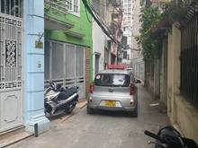 Hình ảnh Nhà Lạc Long Quân 6 tầng Ngõ thông ô tô vào nhà giá 4.8ty