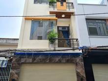 Hình ảnh Bán gấp nhà 2 lầu 62,4 m², gần chợ, HXH, SHR