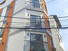 Hình ảnh Nhà 5 tầng 5PN hẻm xe hơi Thống Nhất GV không lộ giới