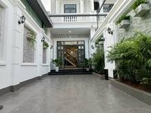 Hình ảnh Cần bán gấp nhà trệt lầu 100m2 sân xe hơi tân phước khánh, tân uyên