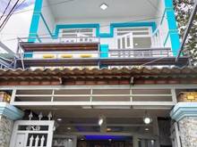 Hình ảnh Cần tiền bán nhà mới xây 160m2 1 trệt 1 lầu đã có sổ 1 sẹc Bình Chánh