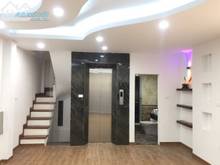 Hình ảnh Cho thuê nhà trần quốc hoàn 65m x 6T thông sàn có thang máy ngõ ô tô đ