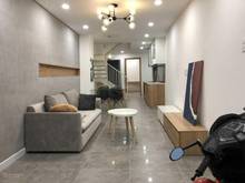 Hình ảnh Bán Nhà Bùi Đình Túy xe hơi vô tới nhà DTSD 112m2 nở hậu 6.37m, 2 Tầng