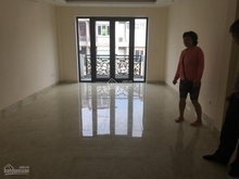Hình ảnh Cho thuê nhà mặt phố Trung Phụng , DT 50m2x6 tầng MT 5m Giá: 50tr/th
