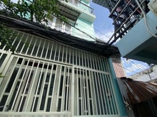 Hình ảnh Đường Bùi Văn Ba, gần Phú Mỹ Hưng, Q4. Ba tầng 4m x 6m. Sổ hồng riêng.